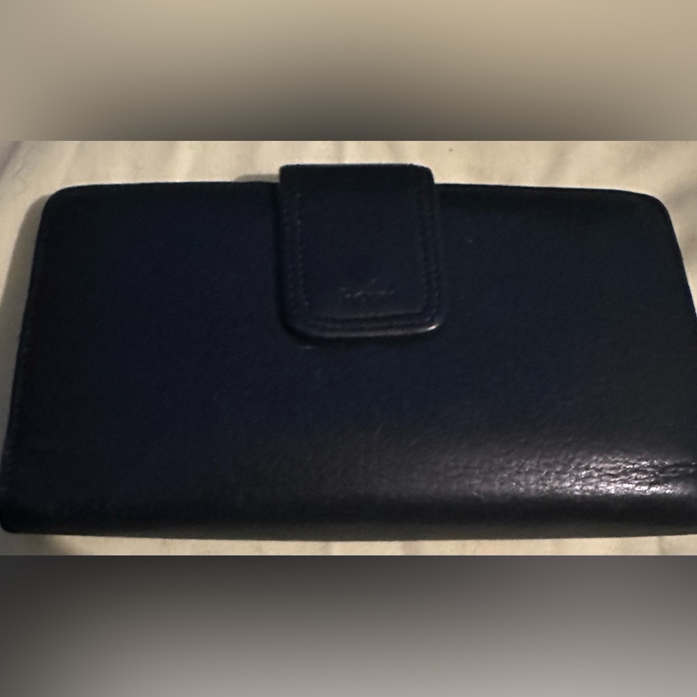 Rolf’s vintage leather wallet with kiss lock